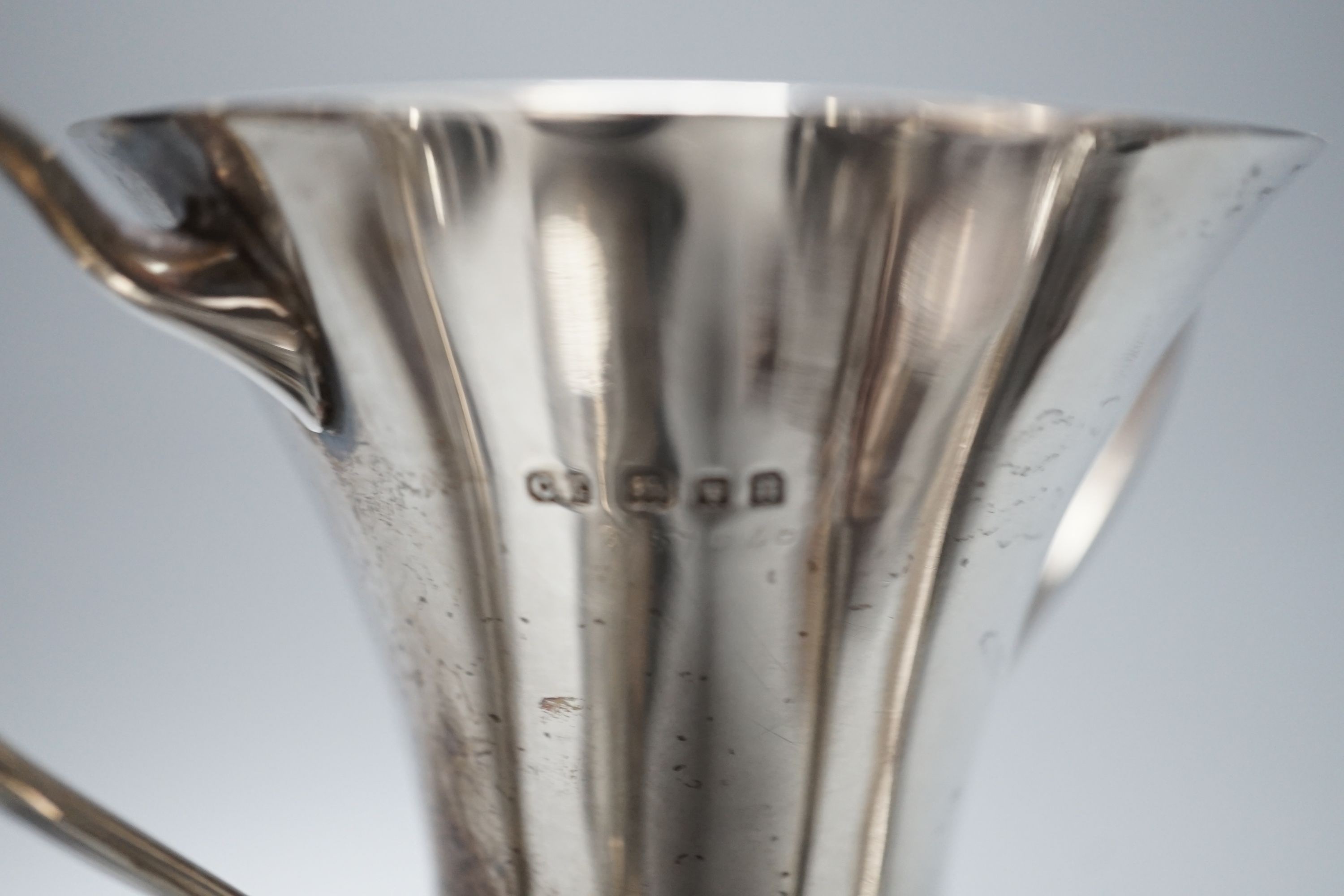 Five assorted 1920's/1930's silver two handled presentation trophy cups, all with engraved inscriptions and all with stands, largest 11.8cm.